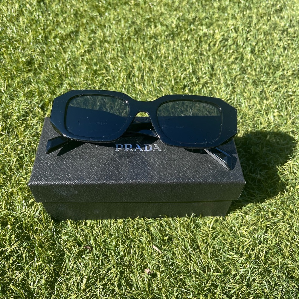 Prada Black Sunglasses with Rectangular Shape and Dark Lenses